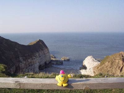 Mr M sat on a seaview bench